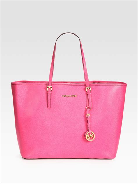 michael kors weekender bag pink|Michael Kors hot pink bag.